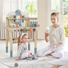 Kids play tool workbench with realistic accessories, featuring wooden tools and a magnetic tool rack for creative play.