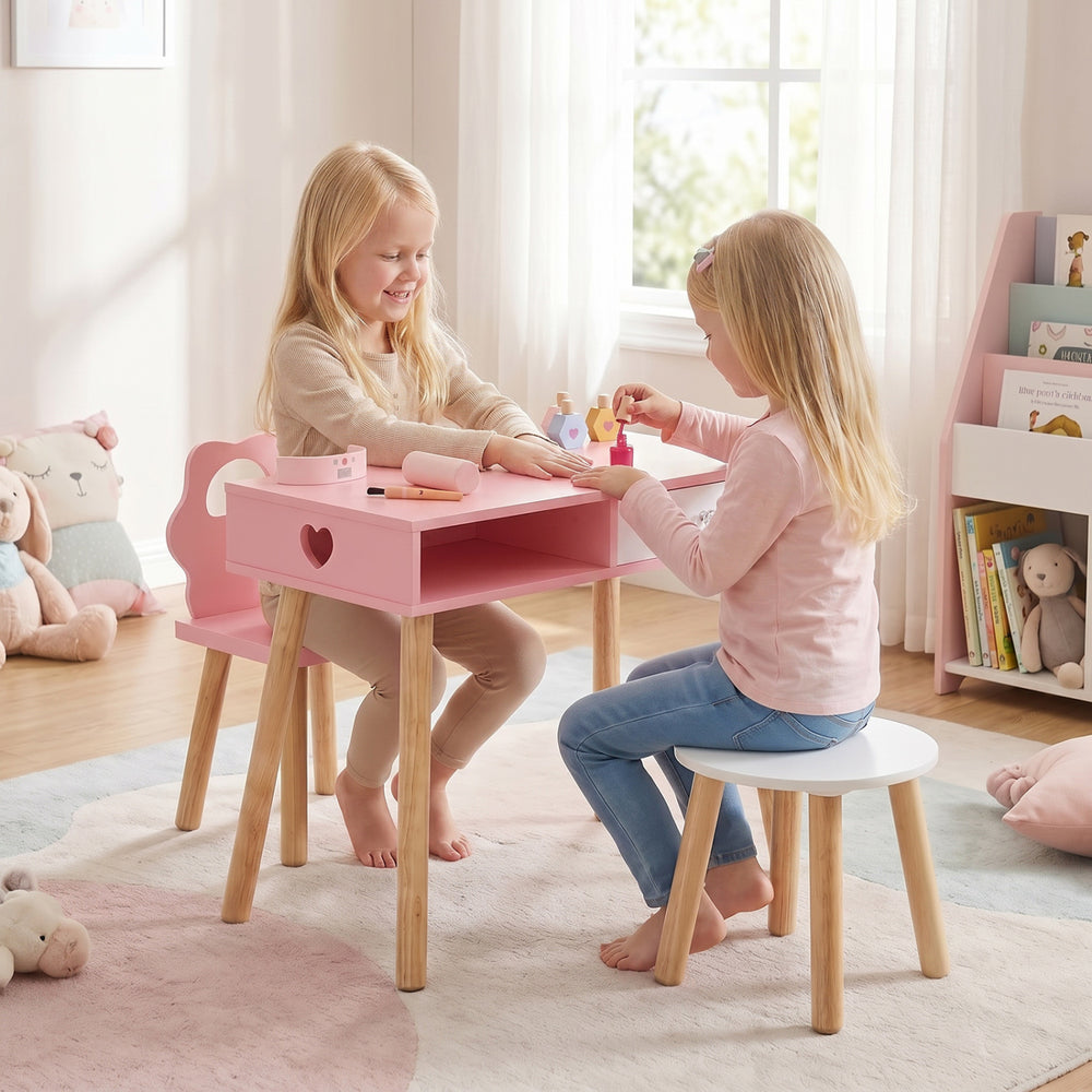 Kids pretend nail salon playset in pink with wooden legs, featuring a table and stool for creative play and storage.