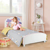 Kids twin size upholstered bed with rainbow-patterned headboard and soft padding, perfect for transitioning from crib.