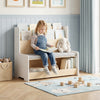 Kids reading nook featuring a white bench bookshelf with cubbies, soft cushion, and rounded corners for safety.