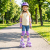 Kids wearing purple adjustable roller skates with light-up wheels, perfect for ages 5-7, in a sunny park setting.