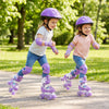 Two kids wearing purple adjustable roller skates with light-up wheels, enjoying a fun day outdoors in the park.
