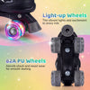 Light-up wheels of adjustable kids roller skates in black, featuring 82A PU wheels for smooth skating and safety.