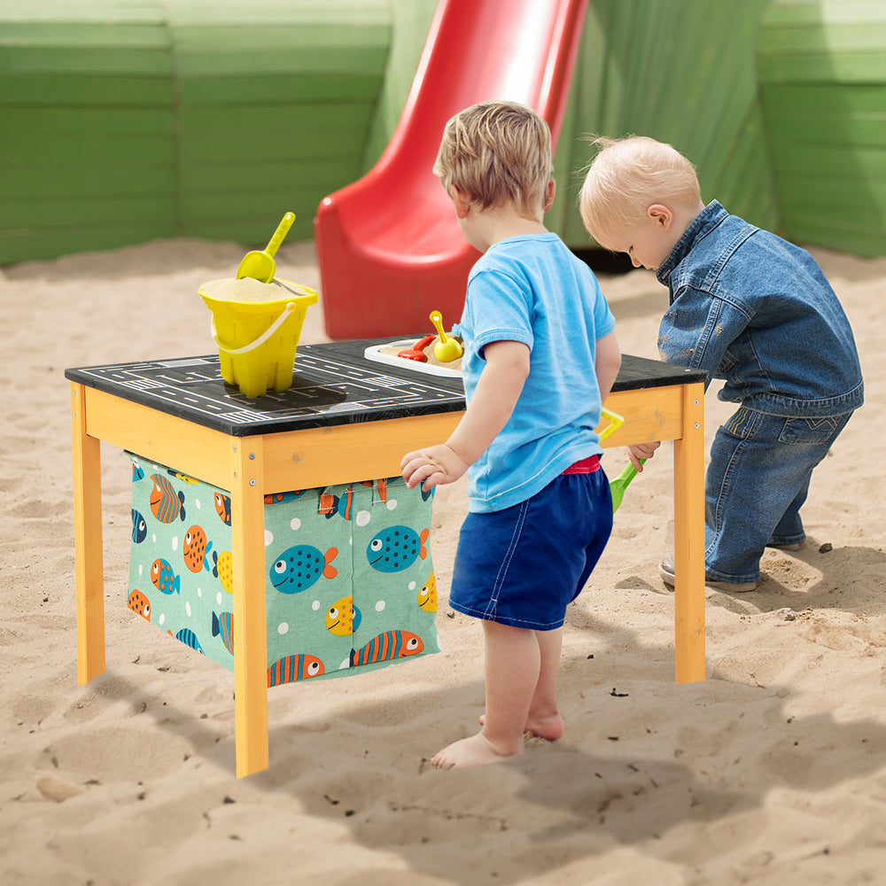 Kids playing at a 3-in-1 sand water activity table with a foldable storage bin, featuring a racing tabletop and animal.