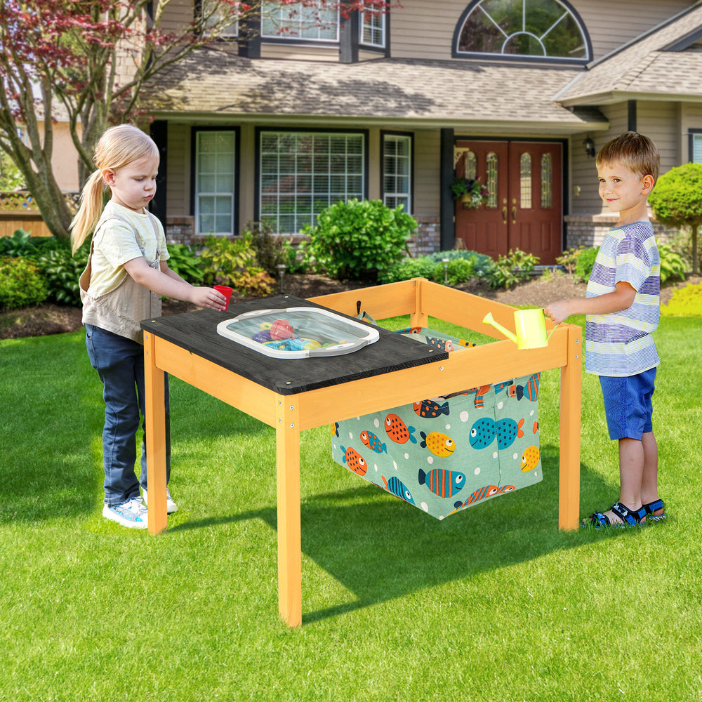Kids playing with the 3-in-1 sand water activity table featuring a removable racing tabletop and built-in storage bin.