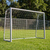 Kids soccer goal with tear-resistant net shown from the front on a grassy field for everyday matches.
