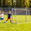 Kids soccer goal with tear-resistant net and galvanized tube frame stands on a field during everyday match practice.