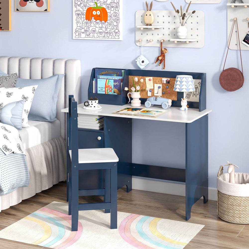 Kids table and chair set in blue features a bookshelf, cabinet, and bulletin board for creative study space in bedrooms.