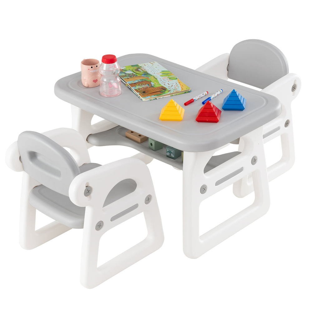 Gray kids table with building blocks and two ergonomic chairs, designed for safety and fun, perfect for kids aged 1-5.