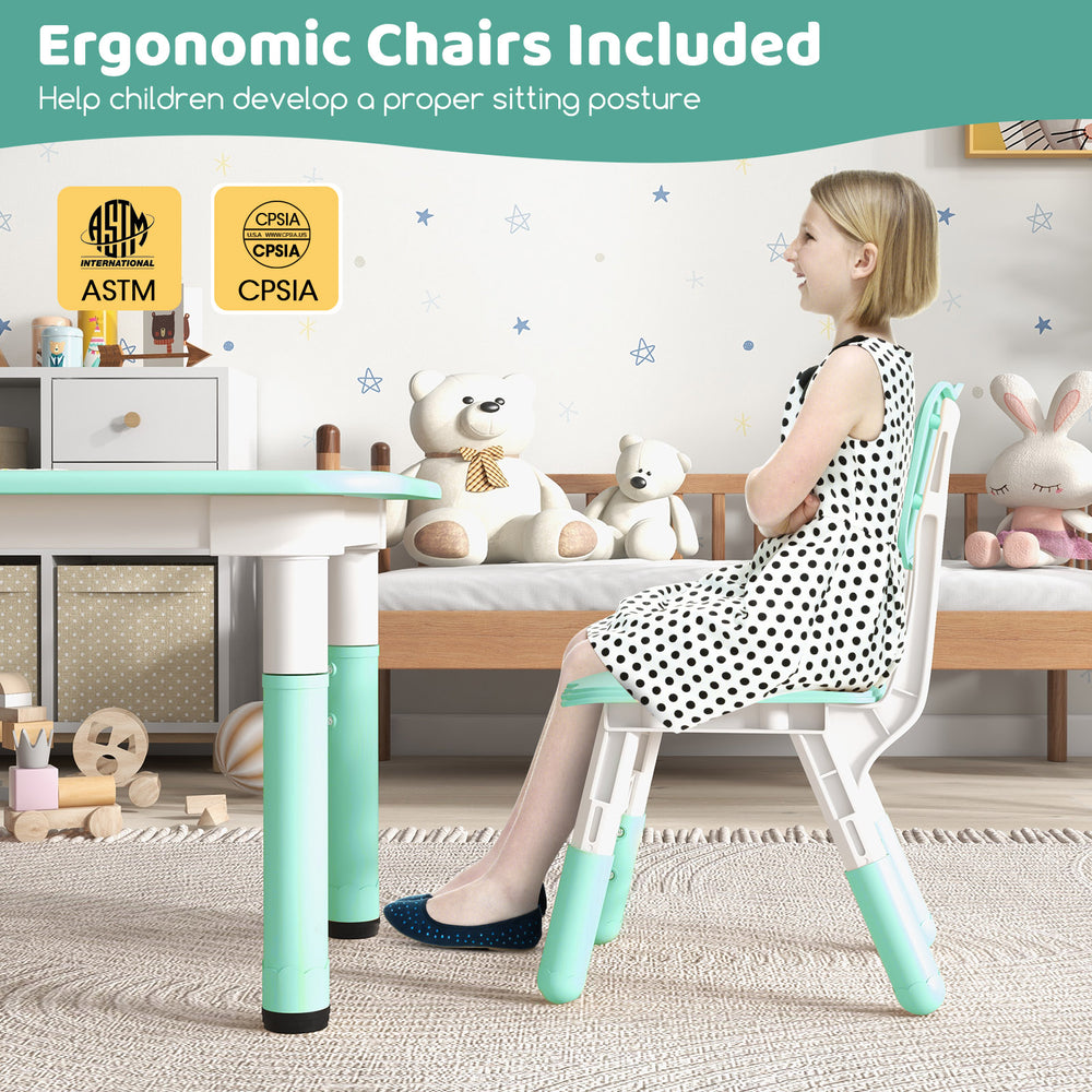 Kids table and chairs set with adjustable heights, graffiti tabletop, ideal for play and learning in children's spaces.