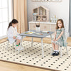 Children enjoying snack time at a gray kids table with bunny ear backrests, suitable for ages 3-6 in a cozy playroom.