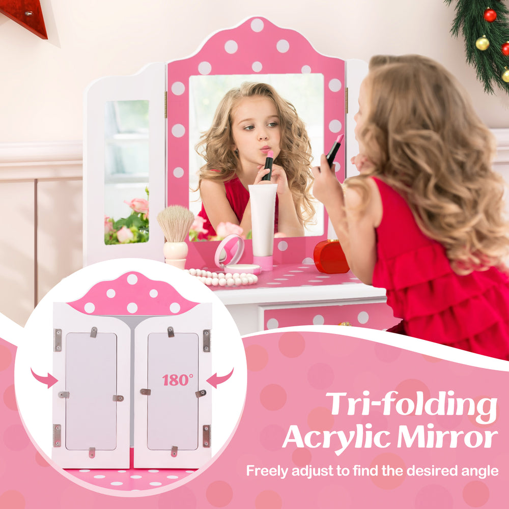 Tri-folding acrylic mirror on a pink polka dot dressing table, adjustable for kids' pretend play and makeup application.