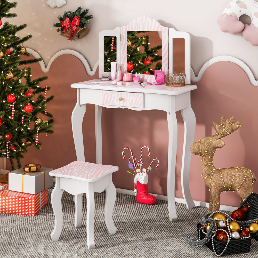 Kids vanity set in pink with tri-fold mirror, storage drawer, and makeup accessories, perfect for children's playroom.