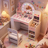 Kids vanity set in white with colorful LED lights, jewelry stand, and organized storage for imaginative play and creativity.