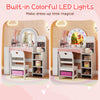 Kids vanity set with colorful LED lights, white finish, includes chair and storage for imaginative play and.