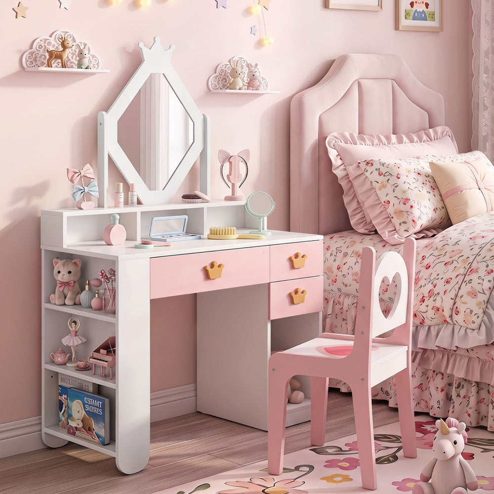Kids vanity set in white and pink featuring a crown mirror, heart-shaped cutout, and convenient storage for girls.