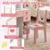 Kids vanity set featuring a pink and white chair with a heart-shaped cutout, perfect for pretend play and study.