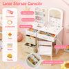 Kids vanity set featuring a lighted mirror, ample storage with shelves and drawers, perfect for dressing and play.