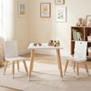 Kids wooden table and 2 chairs set in white, made of pine wood and MDF, perfect for playtime in a nursery or playroom.