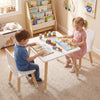 Kids wooden table and 2 chairs set in white, made of pine wood and MDF, ideal for reading, playing, and creating.