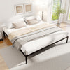 King size metal bed frame with heavy-duty support slats, minimalist design, and ample under-bed storage for a stylish.