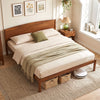 King size wooden platform bed frame with curved headboard in walnut finish, featuring under-bed storage and minimalist design.