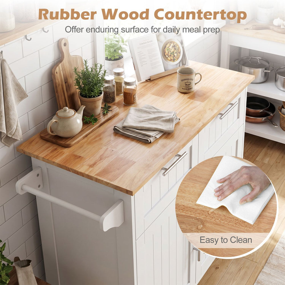 White kitchen island cart with rubber wood countertop, shown in a kitchen with towel rack and adjustable shelves.