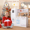 Toddler pretend play kitchen toy with removable water sink and cooking stove for creative meal preparation and.