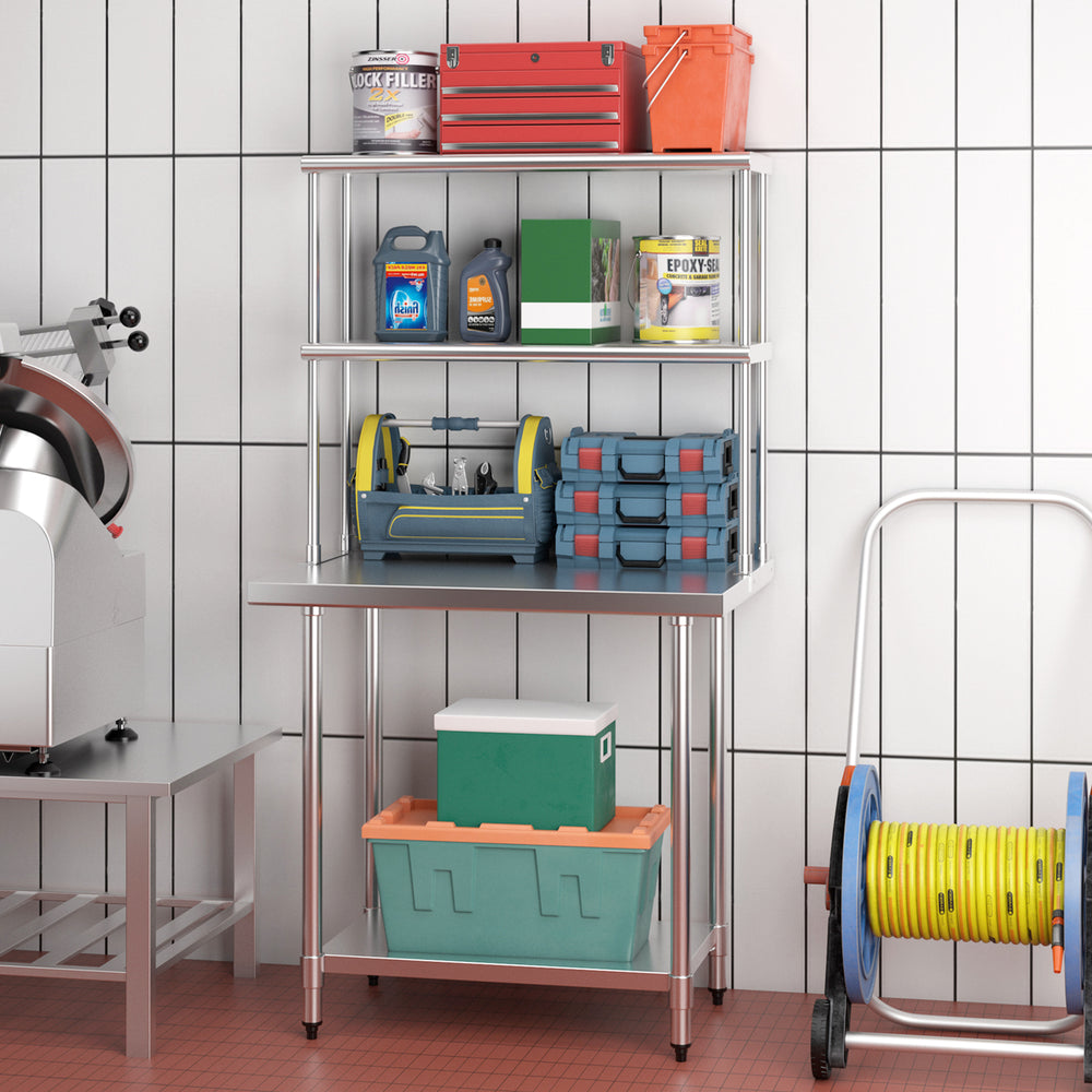 Stainless steel overshelf with adjustable lower shelf, featuring storage for tools and supplies in a kitchen setting.