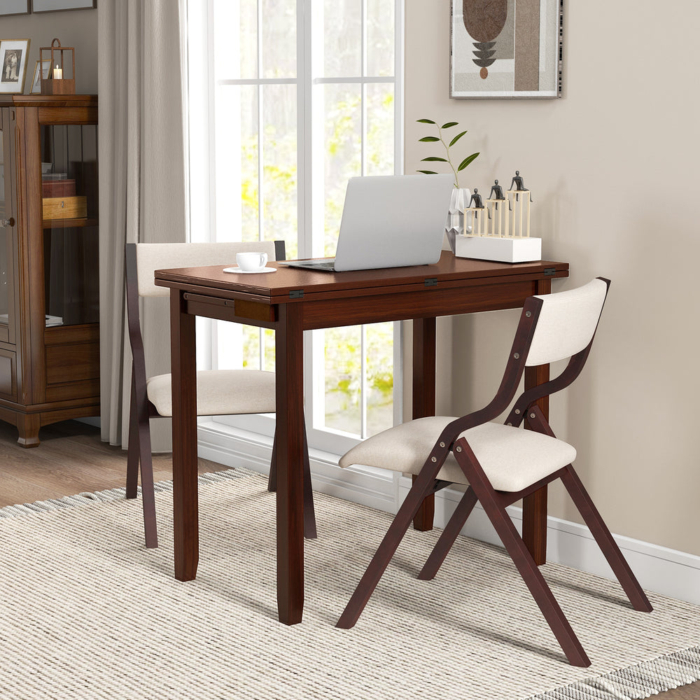 Expandable kitchen table set for 2-4 with upholstered folding chairs, perfect for small dining spaces.