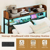 Storage headboard with LED lighting, power outlets, and open shelves for devices, perfect for a full-size bed setup.