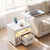 Modern white LED nightstand with flip-over tabletop, power outlets, and organized storage for living room or bedroom.