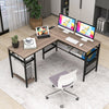 L-shaped computer desk in gray with a large desktop and mesh shelves, ideal for organized home office setups.