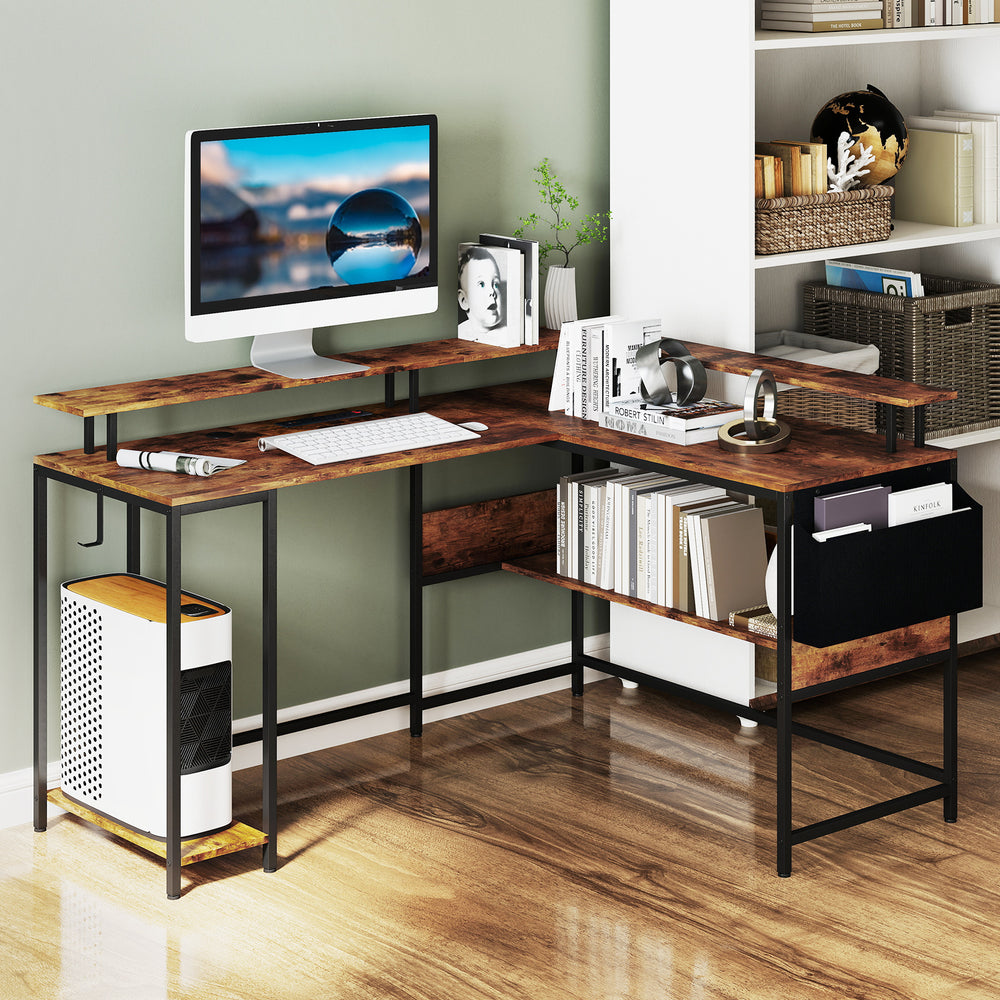 L-shaped gaming desk in rustic brown with LED lights, power outlets, and ergonomic monitor stand for home office use.