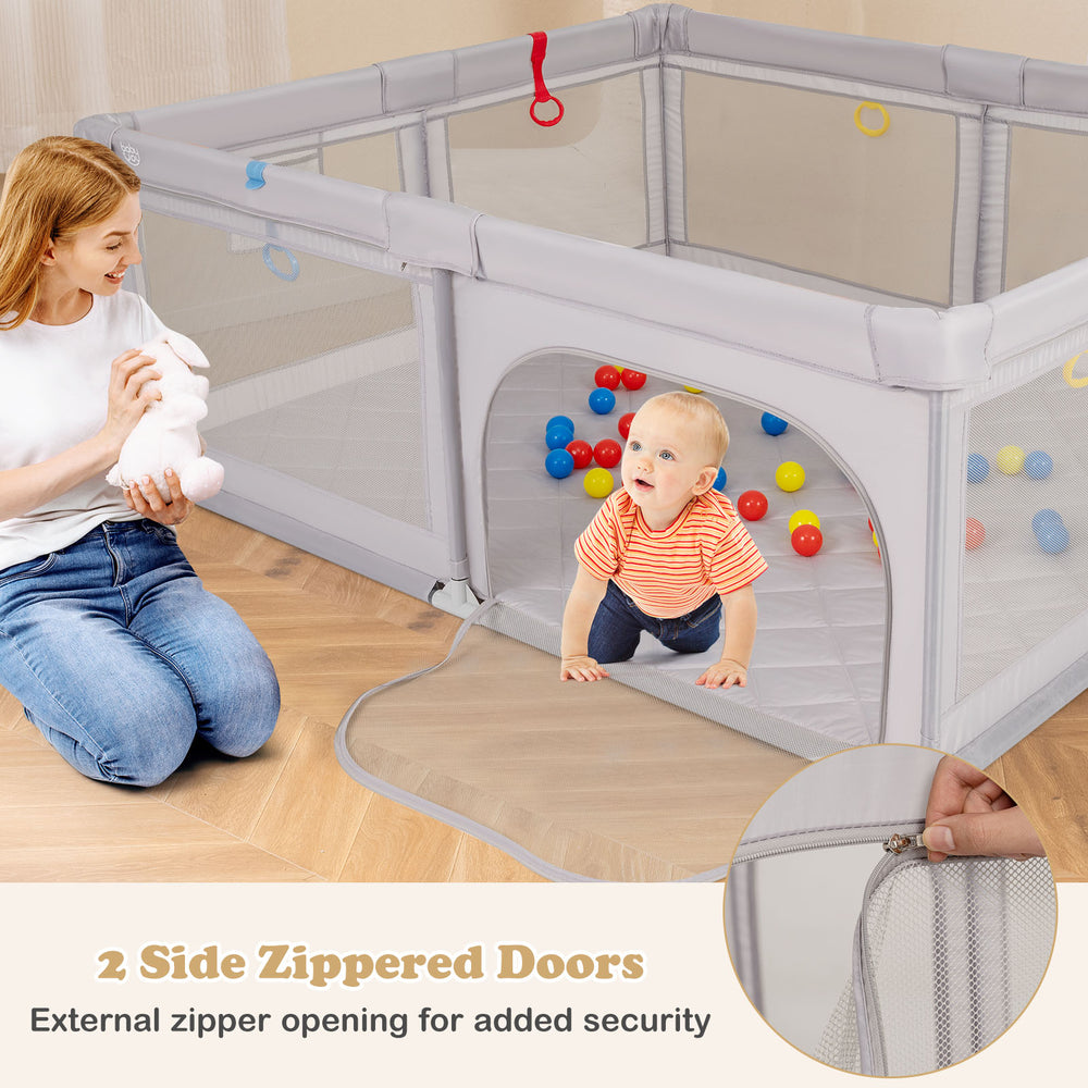 Large baby playpen in gray with 2 side zippered doors, pull rings, and colorful ocean balls for safe play.