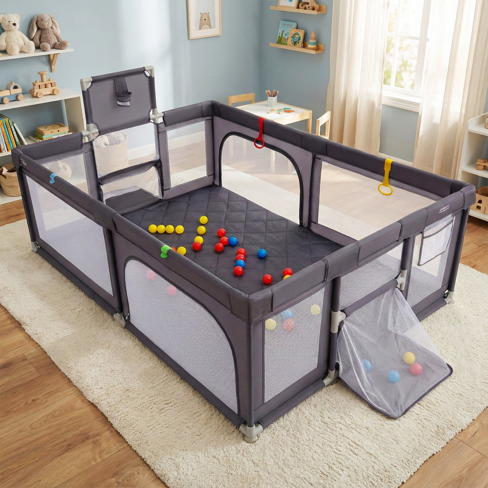 Large dark gray baby playpen with comfortable mat, zippered doors, and mesh walls, ideal for safe play with multiple.