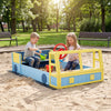 Large car-themed sandbox in blue with fir wood frame, featuring a rotatable rudder for imaginative play, ideal for two.