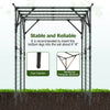Large garden arch trellis in black for climbing plants, featuring a reinforced triangular structure for stability and.