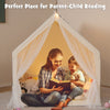Large beige kids play tent with padded mat, star lights, and colorful flags, perfect for reading and playtime.