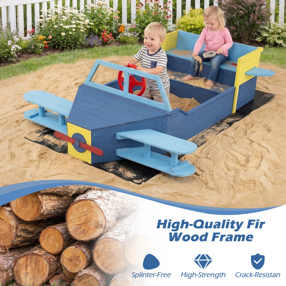 Large blue wooden kids sandbox with bench seat and rotatable rudder, perfect for imaginative outdoor play.