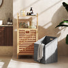 Bamboo tilt-out laundry hamper with foldable basket and two-tier shelves, perfect for bathrooms and laundry rooms.