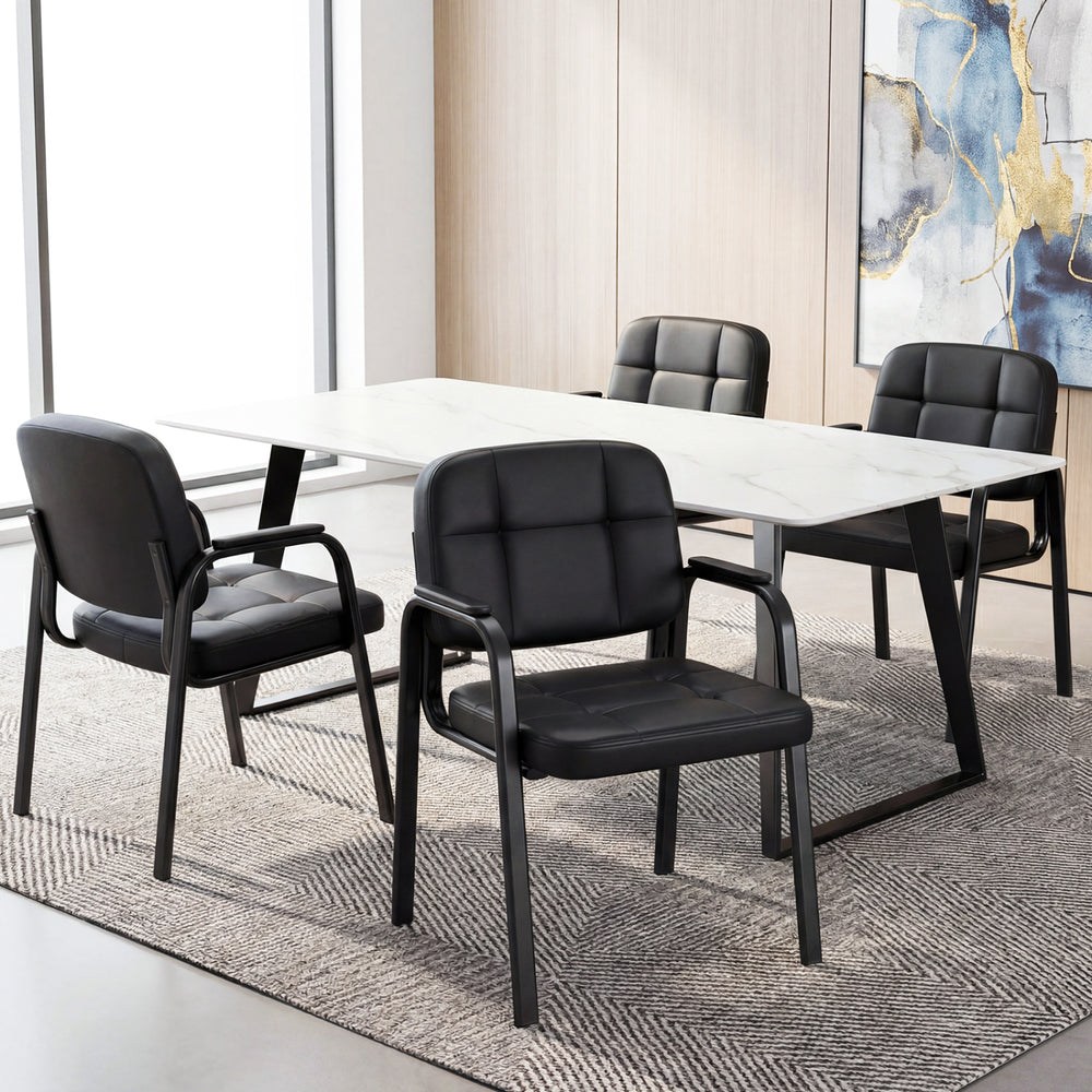 Black leather office reception chairs with cushioned seats and ergonomic backrests, ideal for waiting rooms and home.