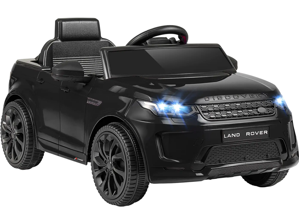 Licensed Land Rover kids ride-on car in black with remote control, bright lights, and ergonomic seat for outdoor fun.
