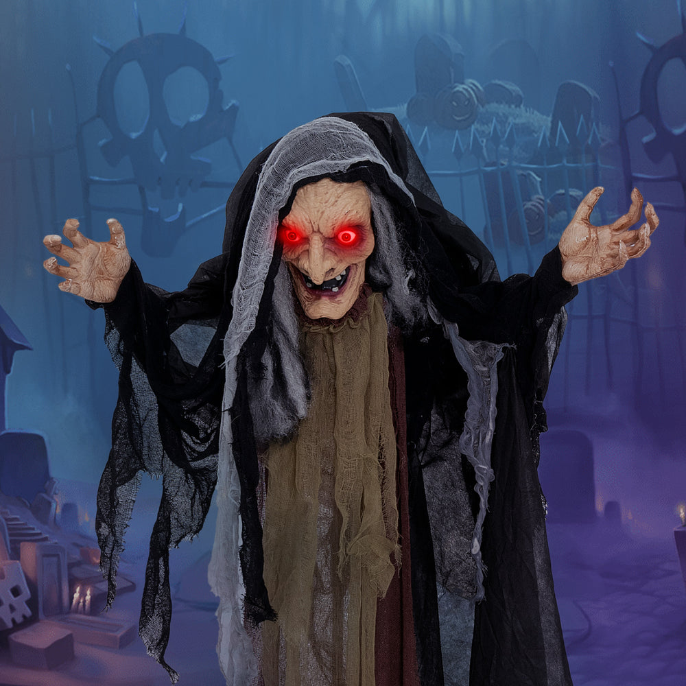 Life-size animatronic witch with red eyes and posable arms, perfect for Halloween parties and haunted houses.