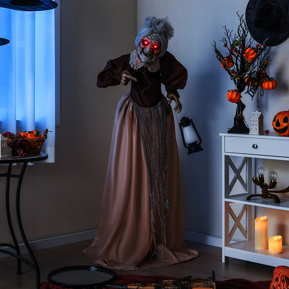 Life-size Halloween animatronic old lady hag prop with glowing red eyes and moving arms, perfect for spooky decorations.