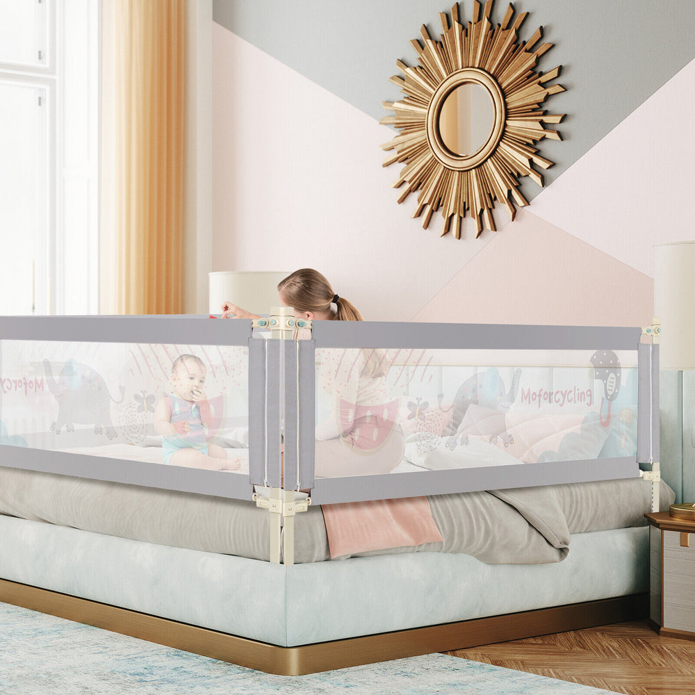 Vertical lifting baby bed rail with cute pattern, adjustable height, and durable steel frame for safety and protection.
