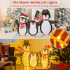 Three penguin Christmas decorations with 194 LED lights, designed for outdoor durability and festive ambiance.