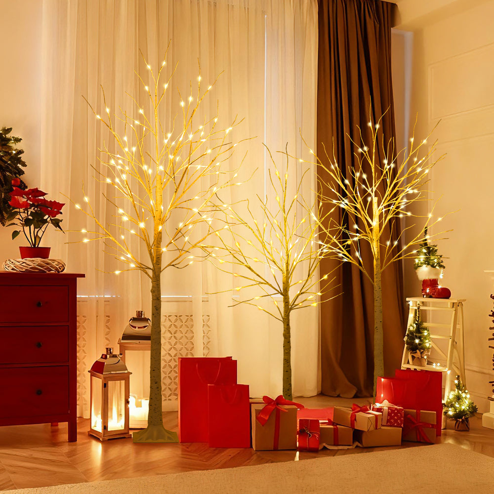 Lighted birch tree set of 3 with warm white LED lights, perfect for holiday decor and indoor or outdoor use.
