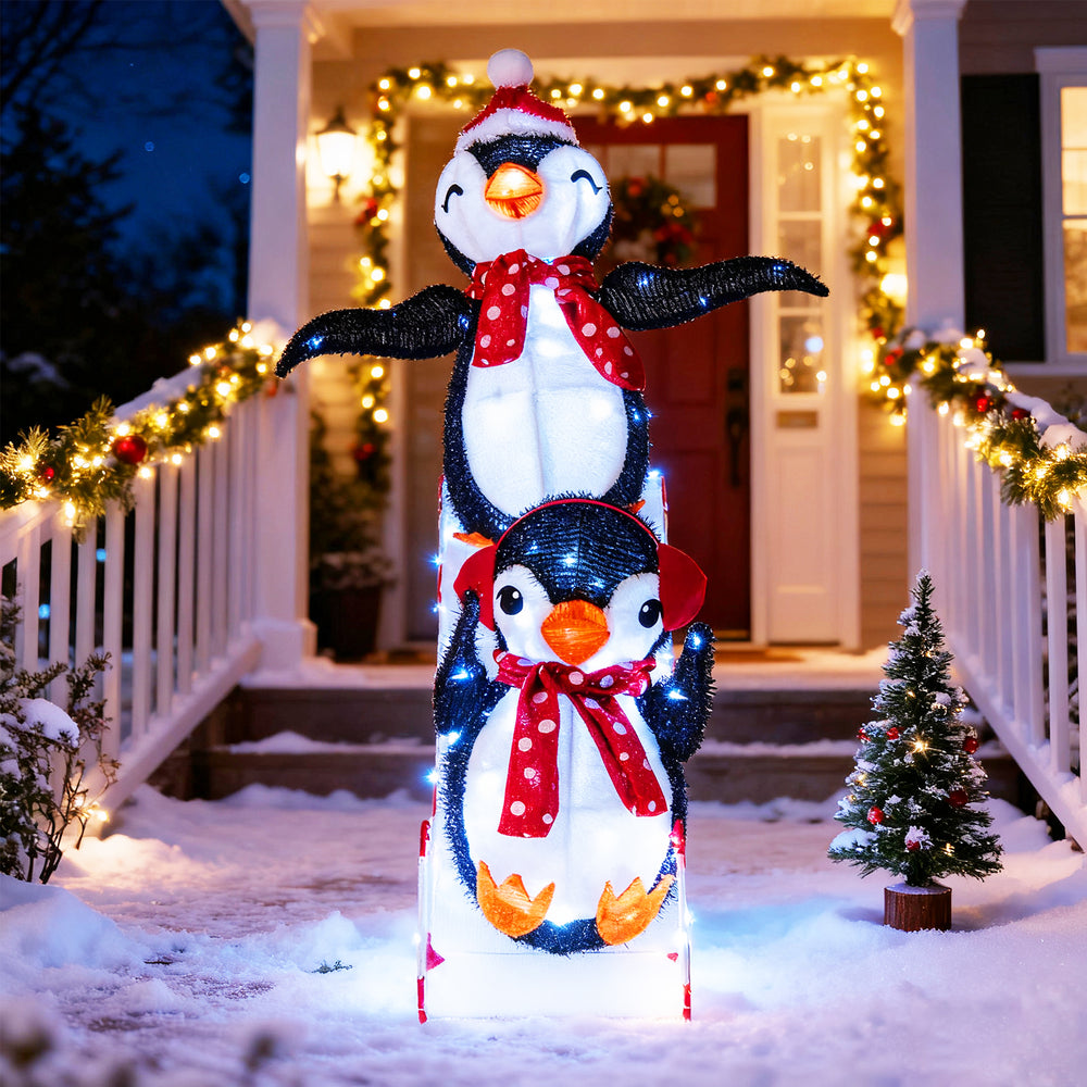 3D lighted Christmas decoration featuring two penguins with red hats and scarves, illuminated by 170 LED lights for.