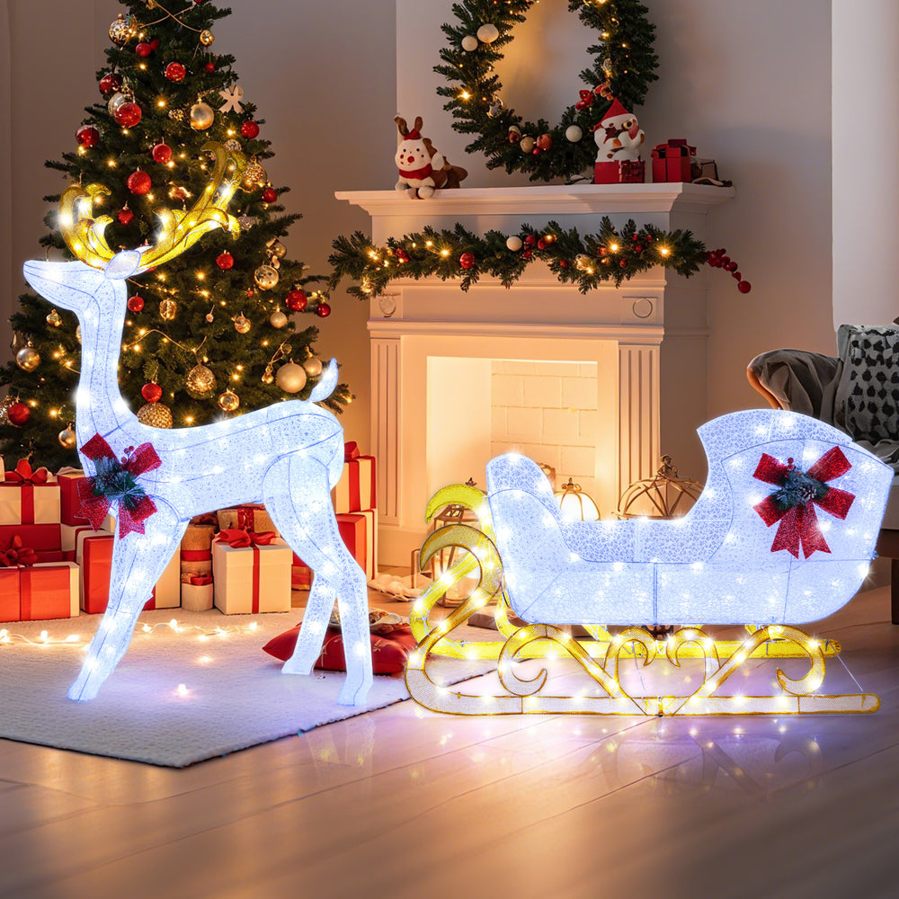 Lighted 6 feet Christmas reindeer and sleigh decoration with 215 LED lights for festive outdoor ambiance.